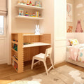Wooden kids desk that has adjustable levels and wooden chair