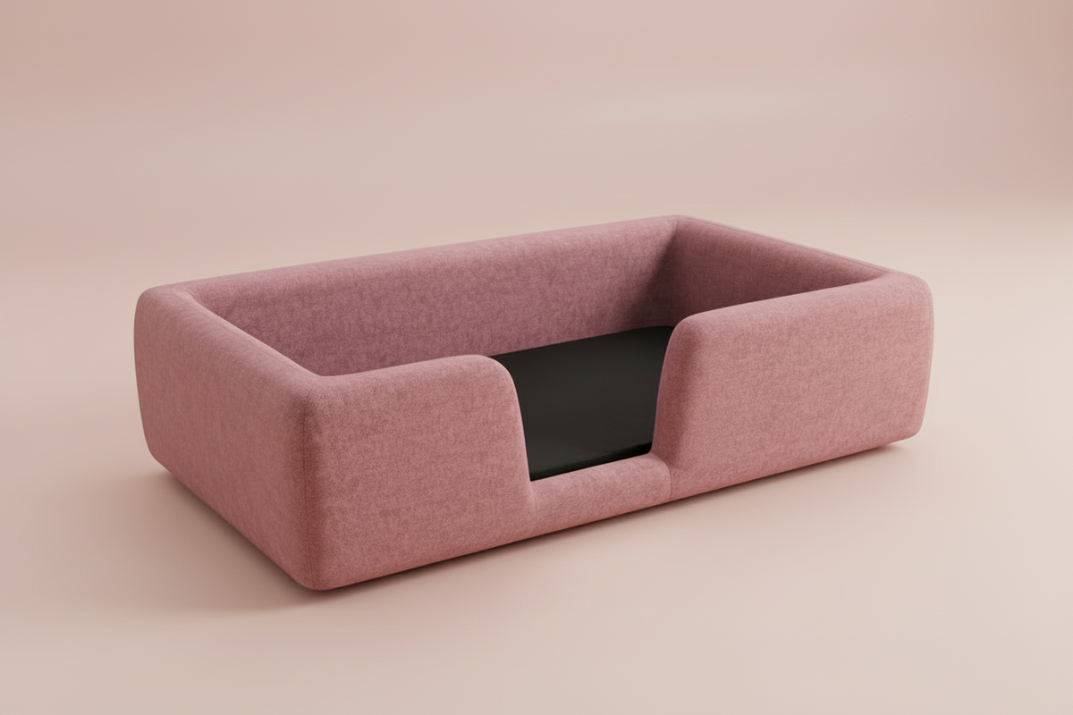 Toddler floor bed in a pink boucle fabric in a pink studio